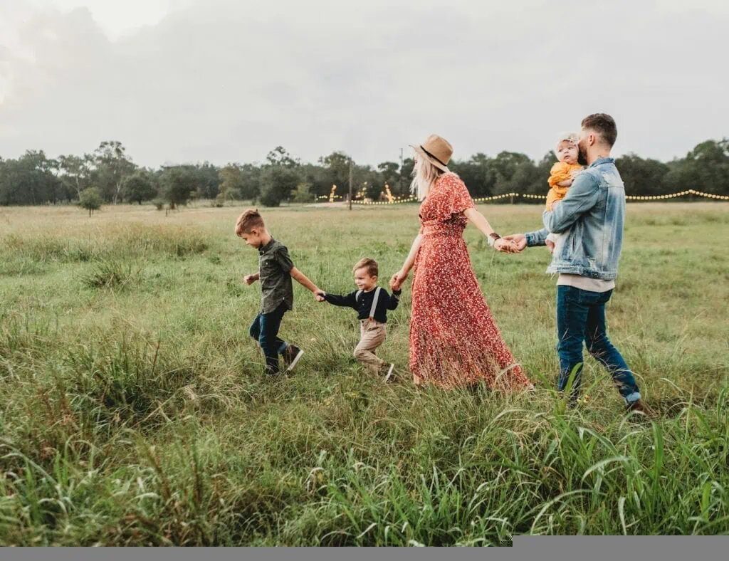 https://unsplash.com/photos/woman-holding-man-and-toddler-hands-during-daytime-5NLCaz2wJXE?utm_content=creditCopyText&utm_medium=referral&utm_source=unsplash